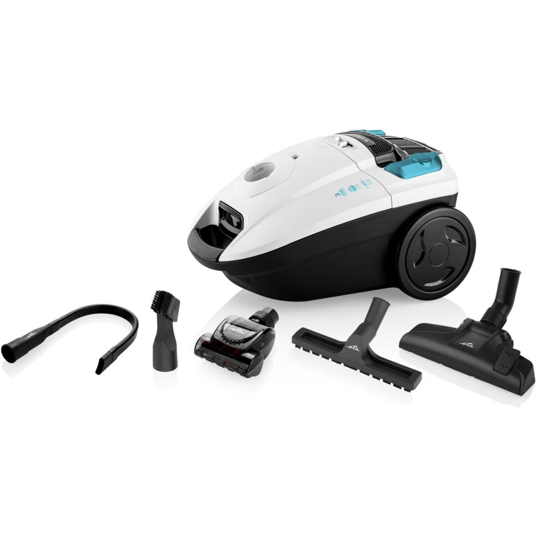 Aspirateur traineau associant un format compact et une prise en main par poignee