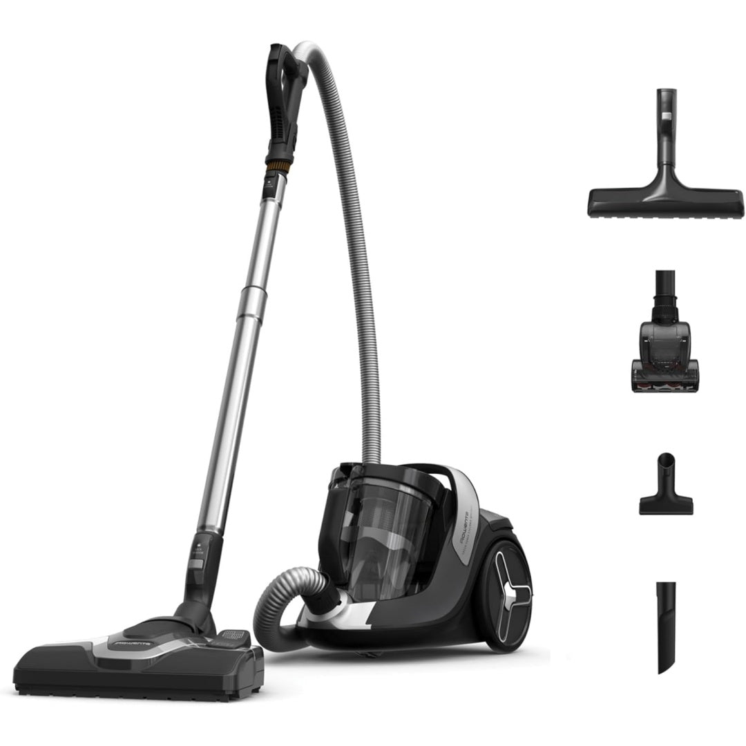 Aspirateur traineau alliant une prise en main par poignee et des elements metalliques
