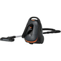 Aspirateur de sol sur roues integrant la collecte de la poussiere et une prise en main par poignee
