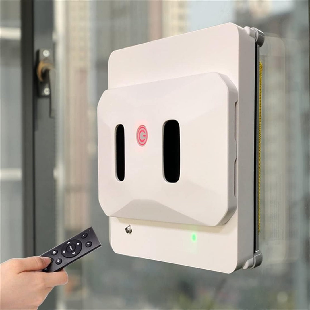 Robot pour surfaces vitrees integrant le nettoyage des surfaces vitrees et une commande a distance